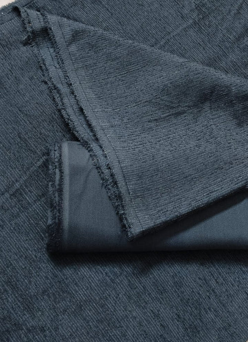 Gray peach wool velvet fabric from Hayadar Clothing, ultra-premium winter material, shown in a close-up view.